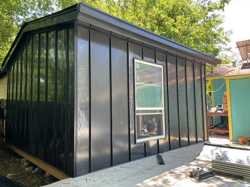 Black standing seam metal wall panels for Metal Roof Installation in Greensboro