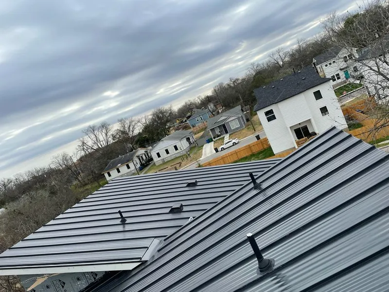 Standing seam metal roof panels with vents for Skylight Repair in Greensboro